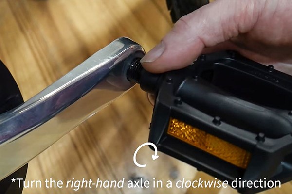 Turn the pedal clockwise to attach the RIGHT HAND PEDAL to the bike